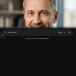 Портрет уверенного бизнесмена компании Сангар на нейтральном фоне в студийном освещении